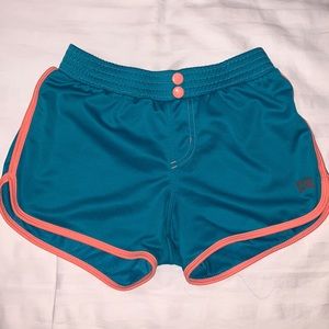 Nike teal and peach athletic shorts